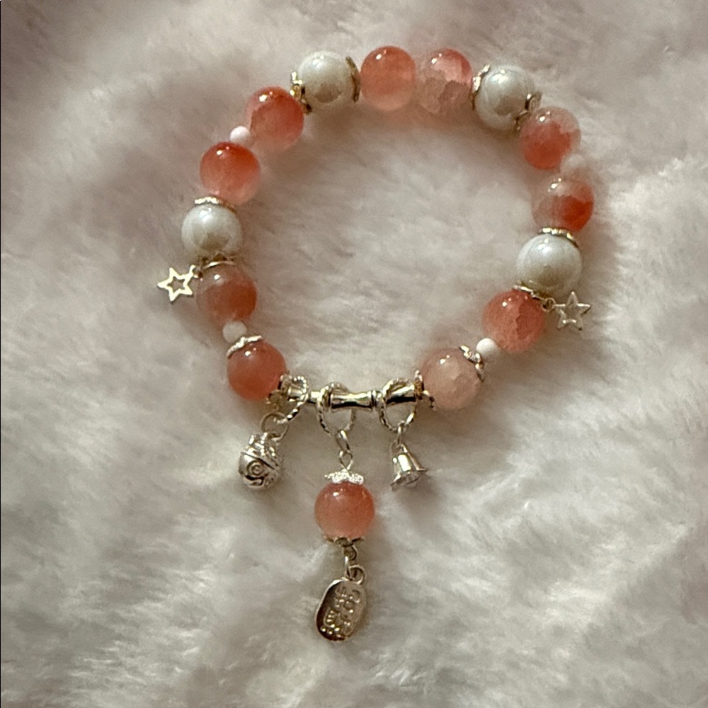 Elegant Beaded Bracelet with Charms